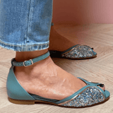 FLAT SANDAL WITH LUMINOUS DETAILS