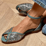 FLAT SANDAL WITH LUMINOUS DETAILS
